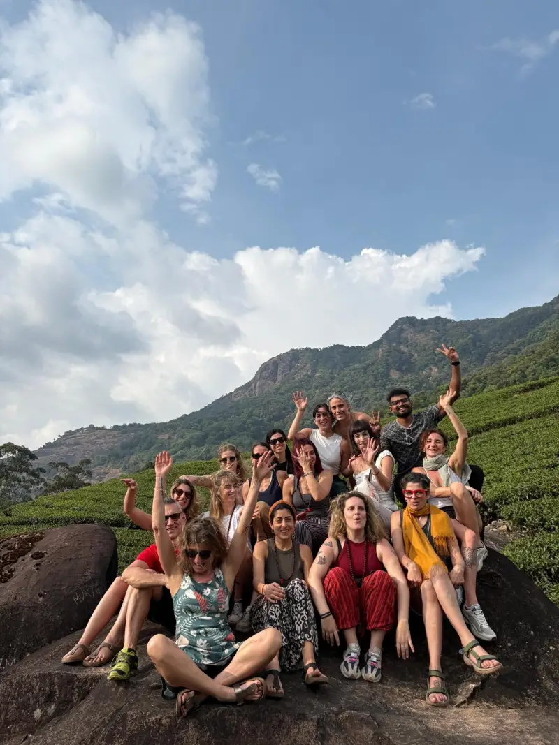 Retreat group on a rock above the Kerala hills